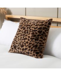 Leopard Print Fleece Cushion, Brown on bed